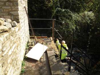 Safety railings being installed outside the Cornish Engine House