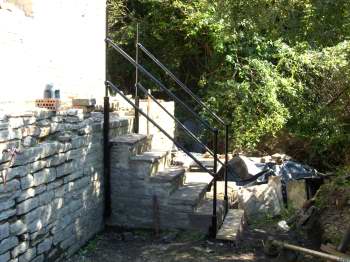 Hand rails around the steps outside the south-west wall of the CEH